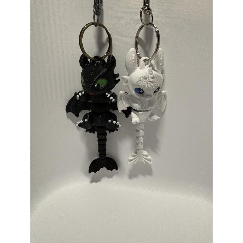 Porte clé noir dragon 